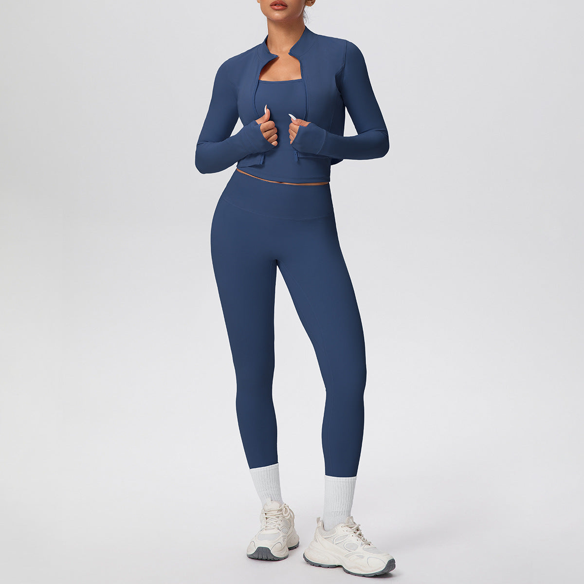 Solid color zipper long - sleeve jacket, racerback tank top, and slim - fit yoga pants, a three - piece yoga/fitness set