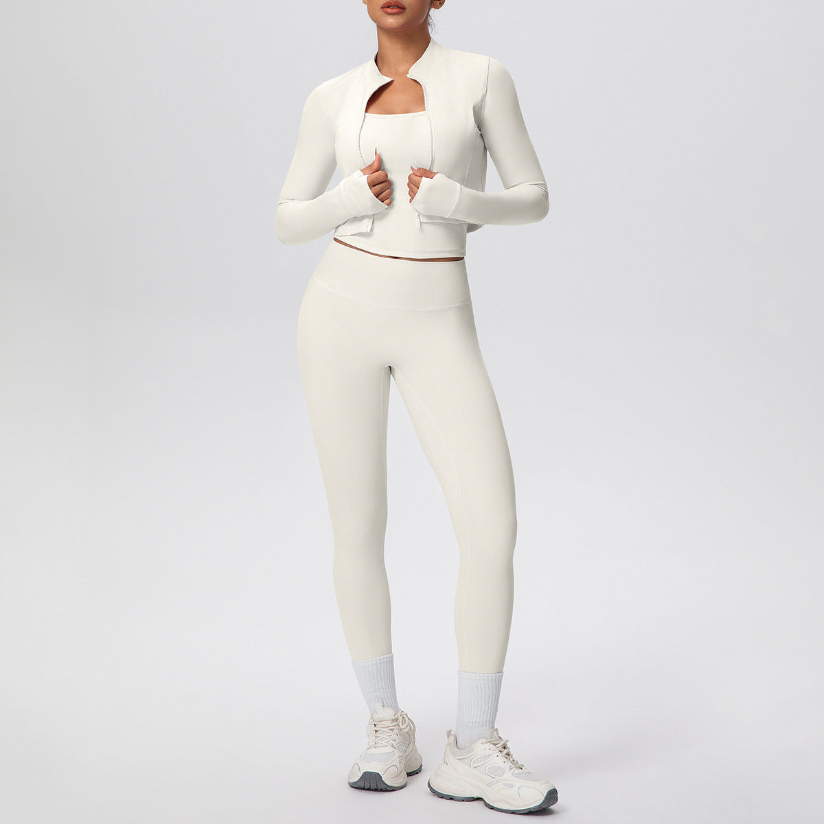 Solid color zipper long - sleeve jacket, racerback tank top, and slim - fit yoga pants, a three - piece yoga/fitness set