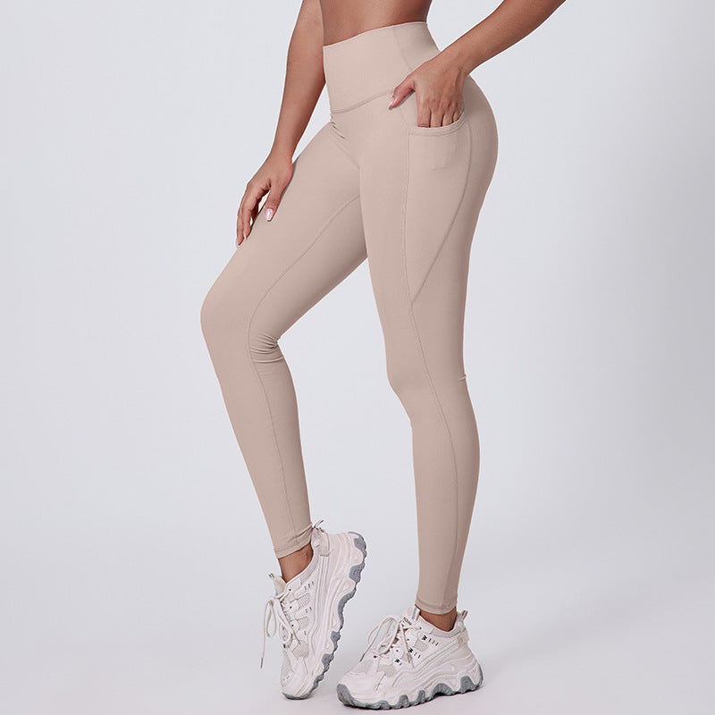 Tight-fitting yoga pants with pockets that pull in your belly and lift your hips