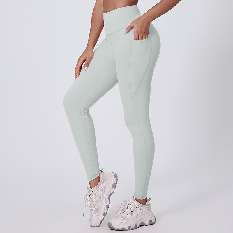 Tight-fitting yoga pants with pockets that pull in your belly and lift your hips